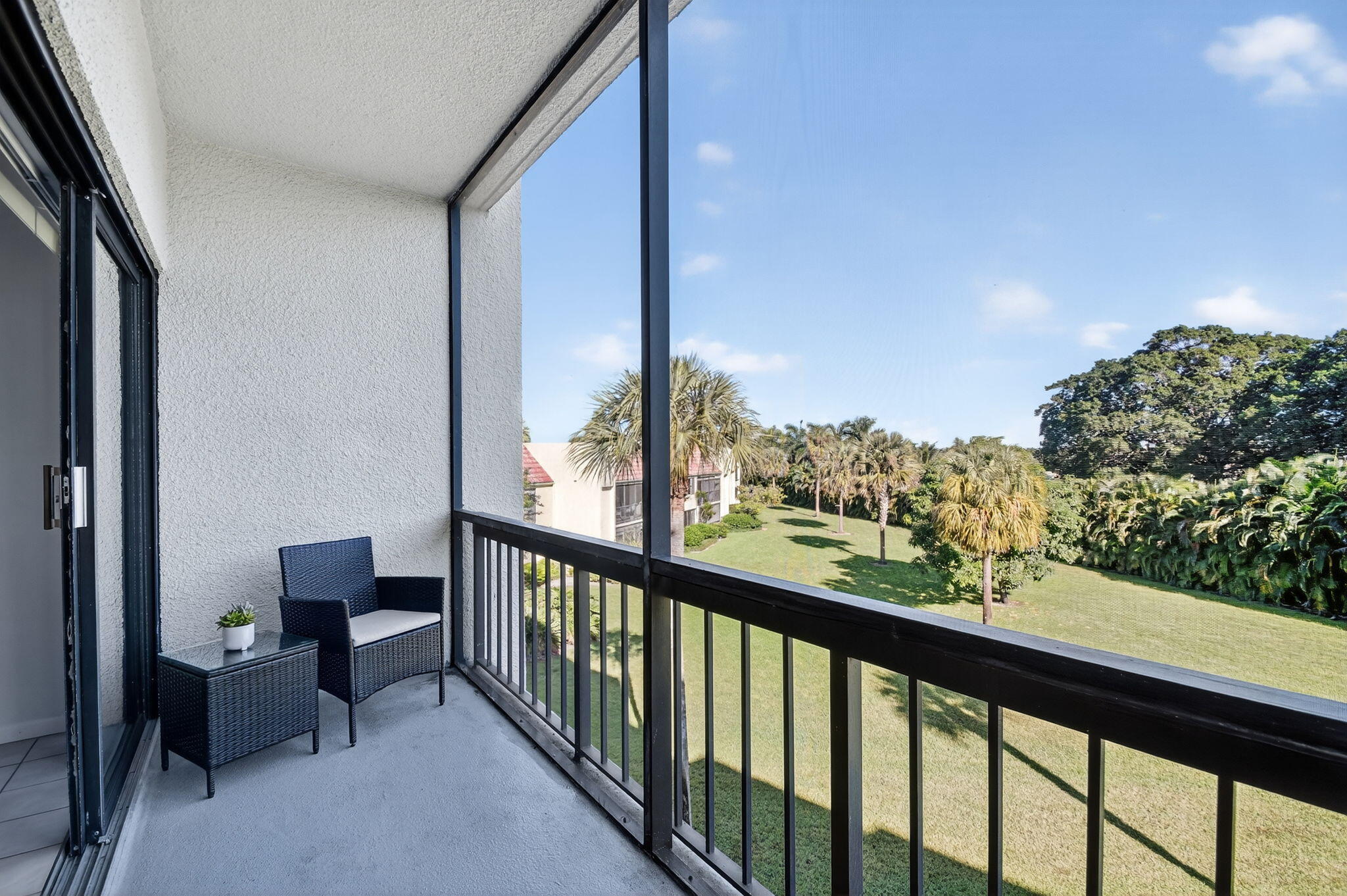 2500 Presidential Way, Unit 302 West Palm Beach, FL 33401 - Photo 20 of 52 a view of balcony with furniture