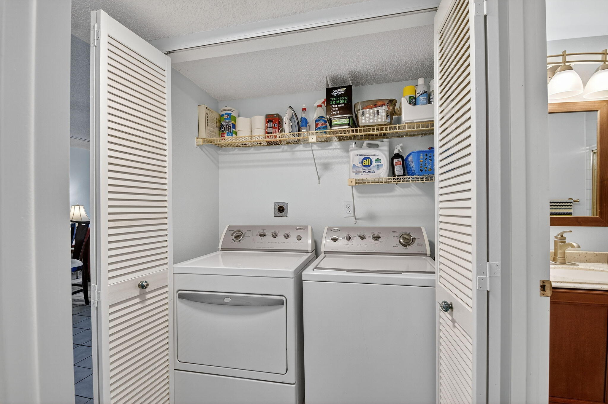 2500 Presidential Way, Unit 302 West Palm Beach, FL 33401 - Photo 35 of 52 a utility room with dryer and washer