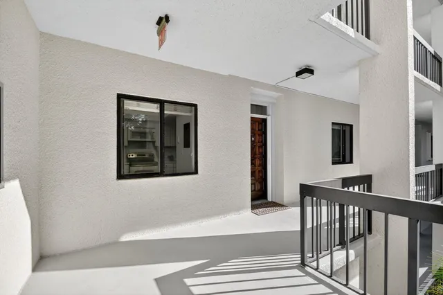 a view of a hallway with entryway