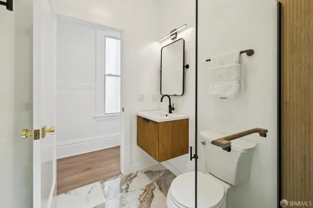 a bathroom with a sink and shower