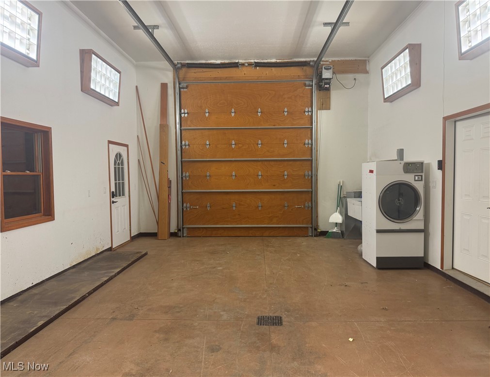 8362 Riverside Drive Novelty, OH 44072 - Photo 35 of 49 Extra Large Garage to house high top/extended length van/truck, industrial clothes dryer, elevator in lowered postion