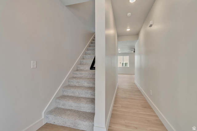 2535 West Santa Fe Drive Mapleton, UT 84664 - Photo 5 of 26 Stairs with wood finished floors and recessed lighting