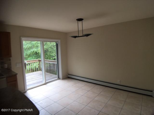 137 Ryan Road Blakeslee, PA 18610 - Photo 5 of 13 a view of empty room with wooden floor