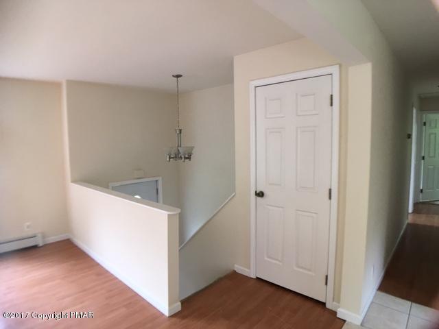 137 Ryan Road Blakeslee, PA 18610 - Photo 6 of 13 a view of an empty room with ceiling fan