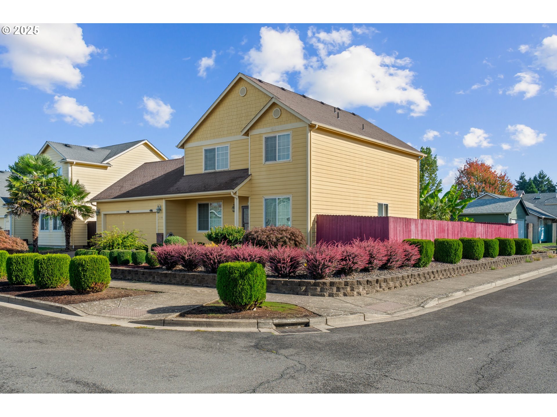 4199 Geranium Loop Northeast Salem, OR 97305 - Photo 2 of 43 a view of a house with a yard and potted plants