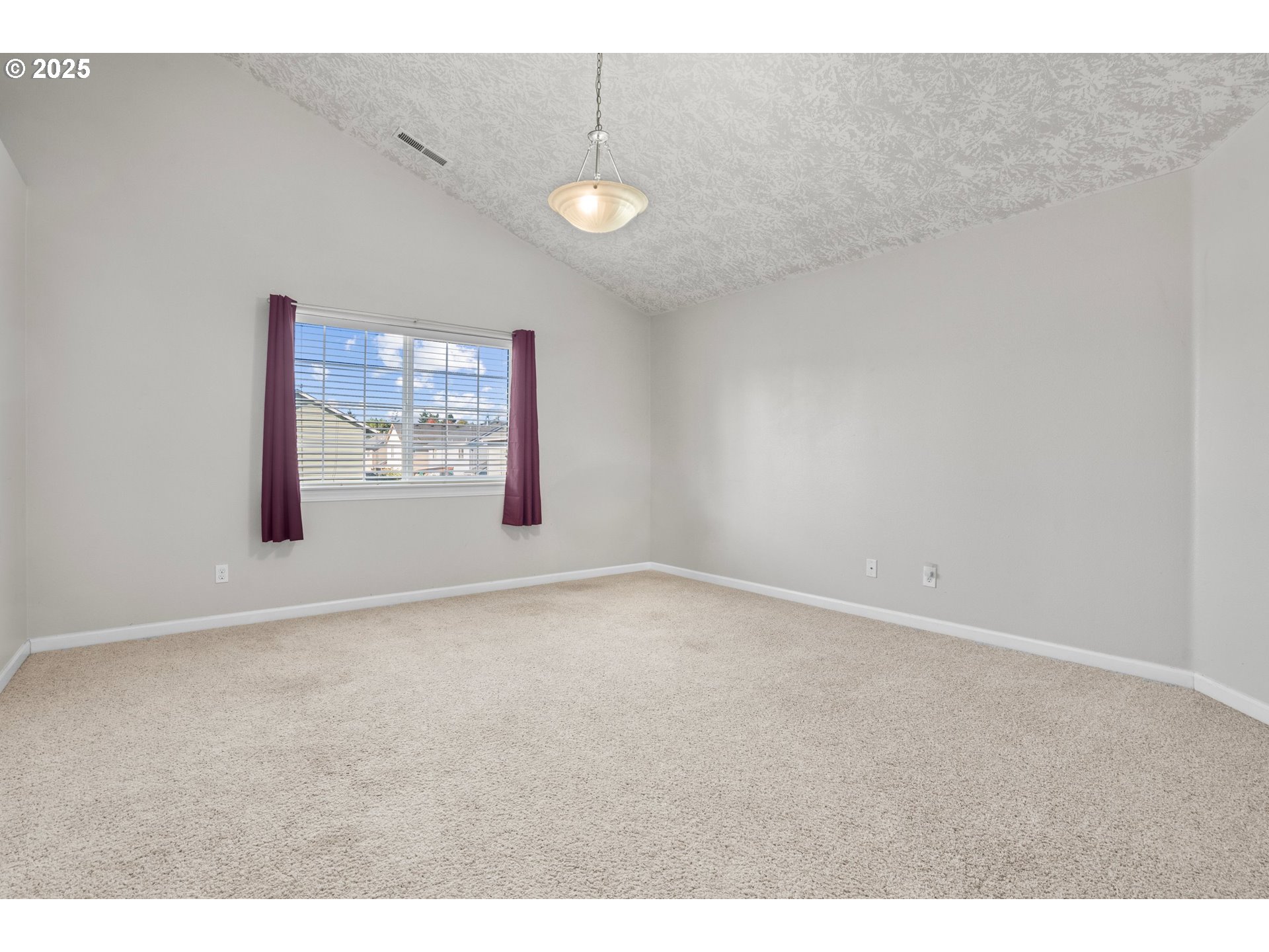 4199 Geranium Loop Northeast Salem, OR 97305 - Photo 28 of 43 a view of an empty room with a window