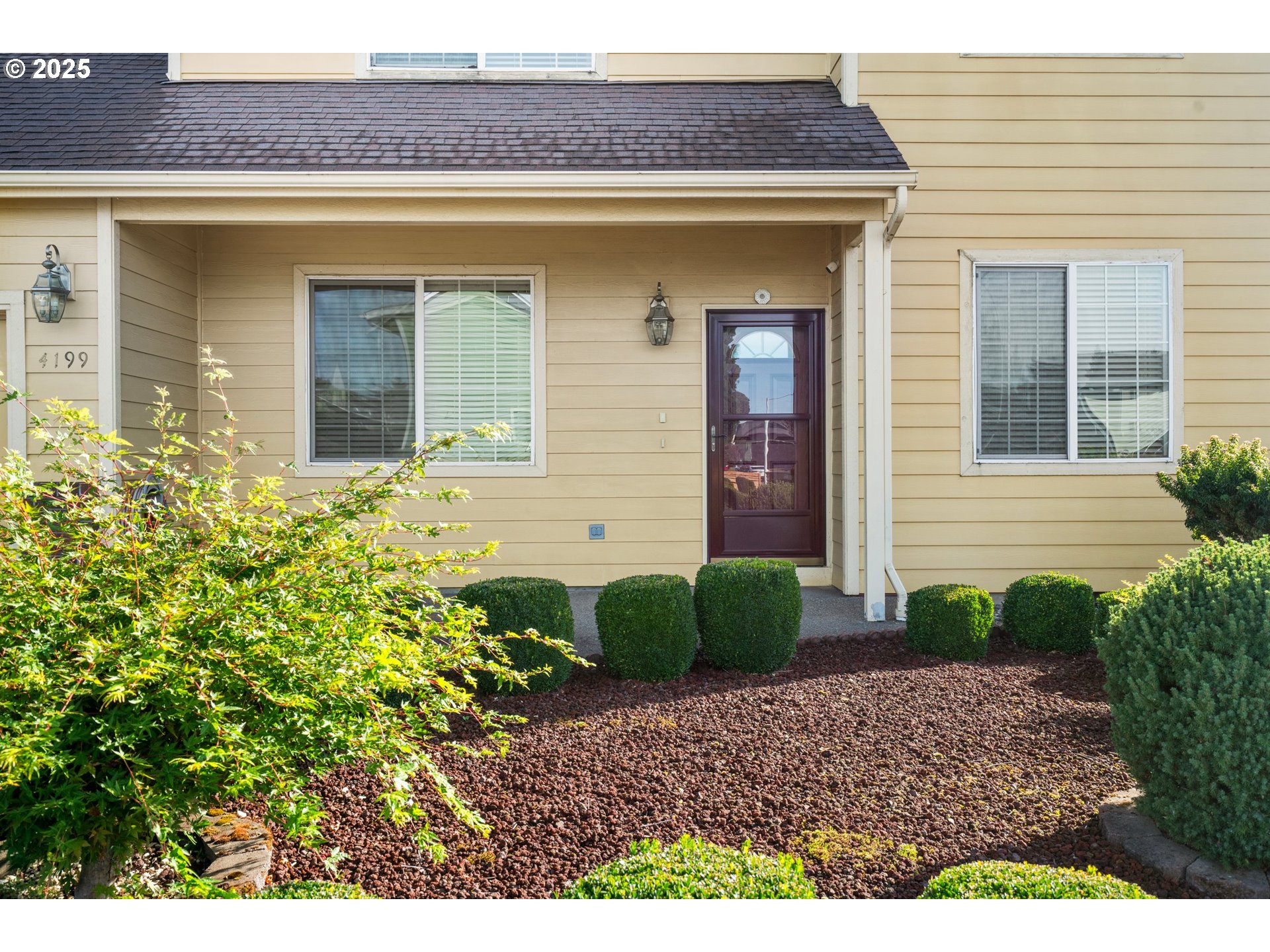 4199 Geranium Loop Northeast Salem, OR 97305 - Photo 3 of 43 a front view of a house with garden