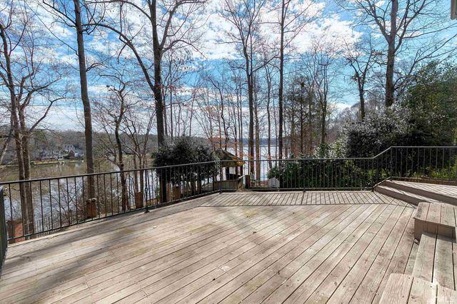 a view of a lake with a yard