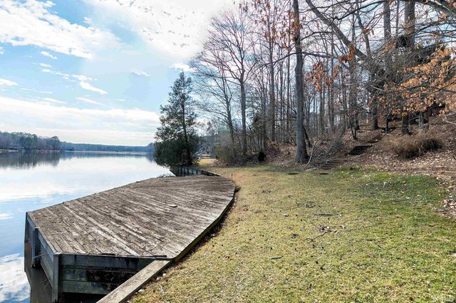 a house with trees in the background