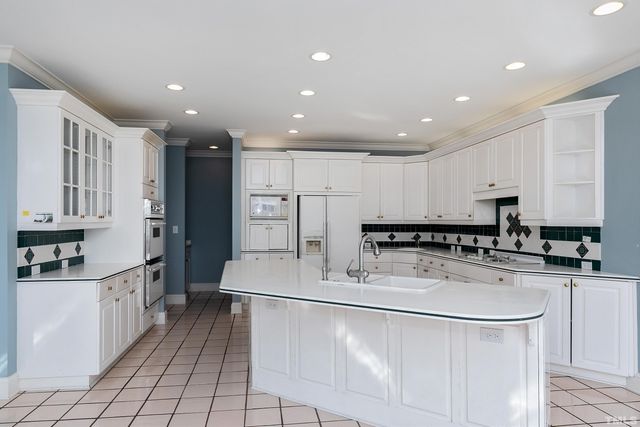 a backyard of a house with lots of green space