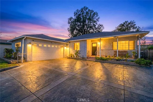 a view of swimming pool with an outdoor space and seating area