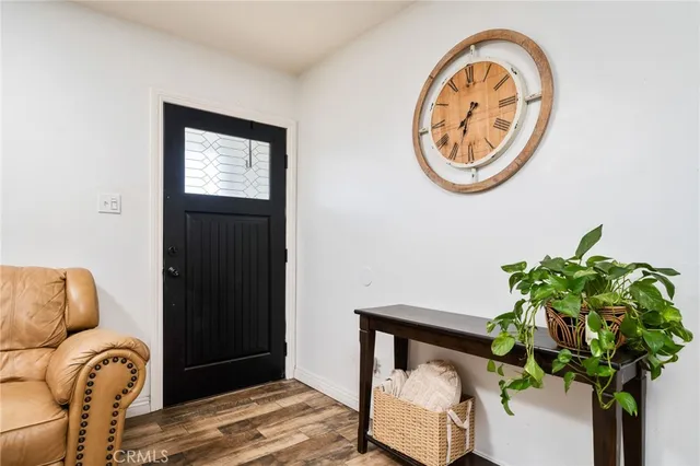 a vase with flowers sitting on a table