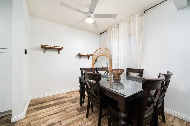 a view of a table and chairs in a patio