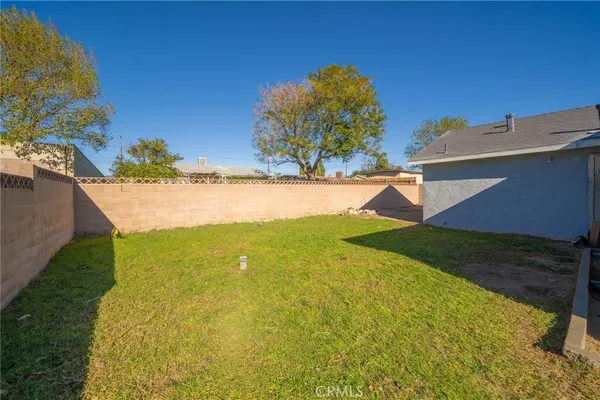 a view of a yard with an outdoor space