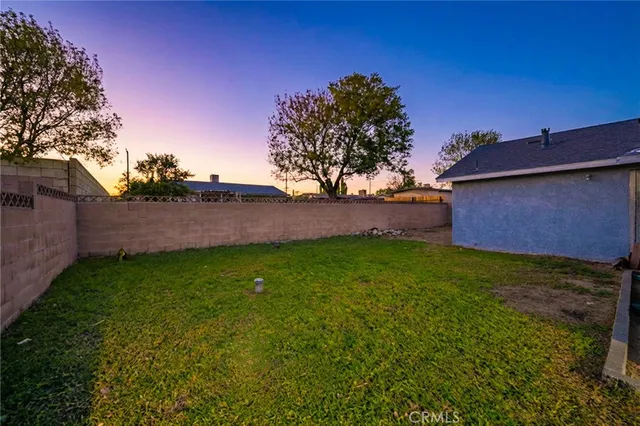 a backyard of a house with lots of green space