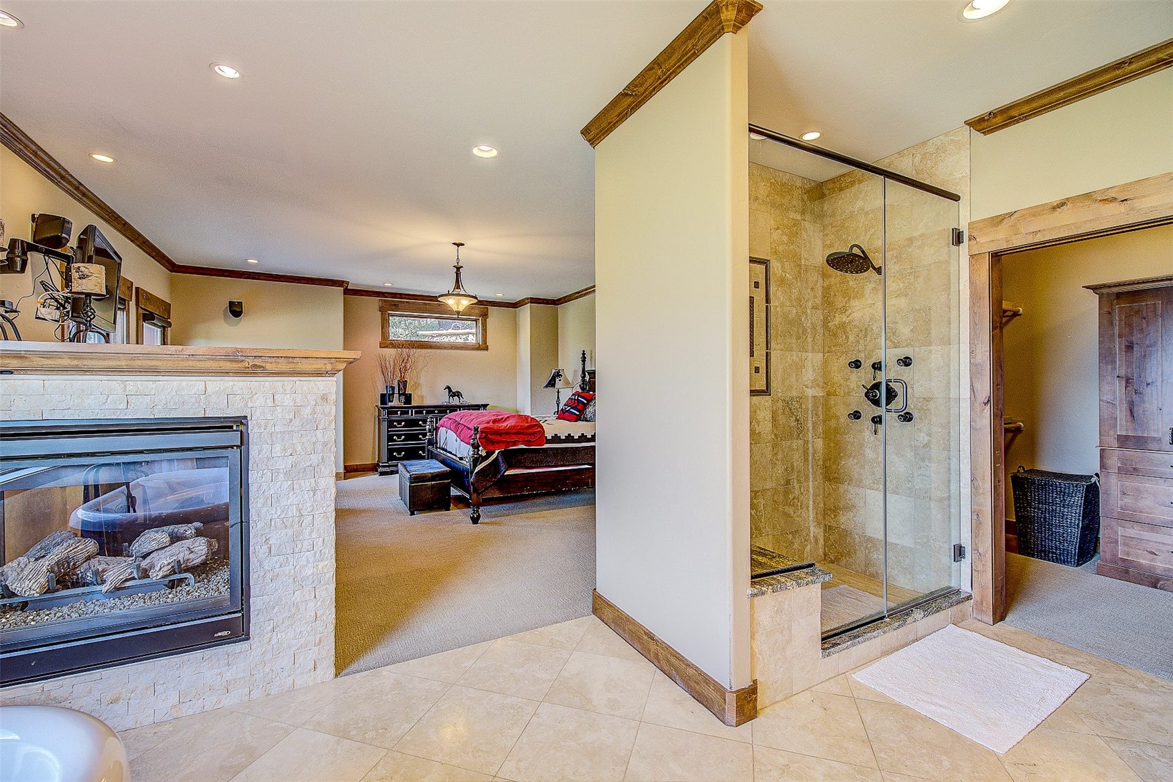 59 Club House Road, Unit C Breckenridge, CO 80424 - Photo 14 of 50 Bathroom with carpet, crown molding, a shower stall, recessed lighting, and tile patterned flooring