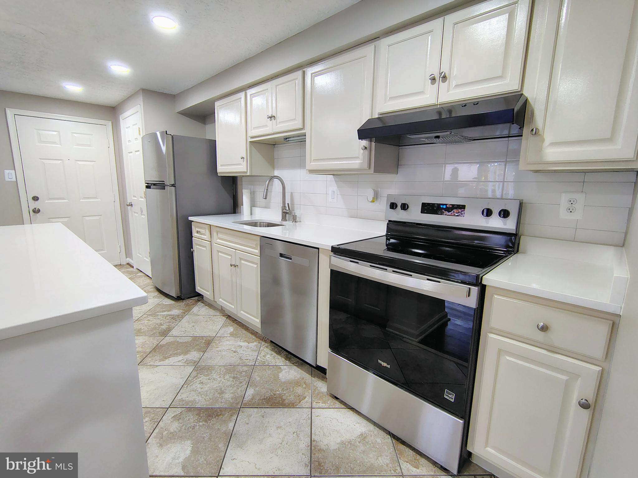 Modern kitchen with sleek finishes.
