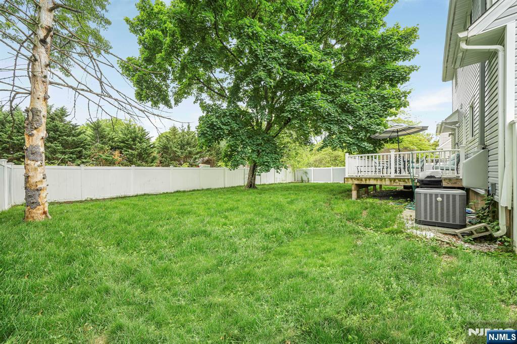 52 Barbara Drive Pompton Lakes, NJ 07442 - Photo 27 of 30 a view of a backyard with sitting area