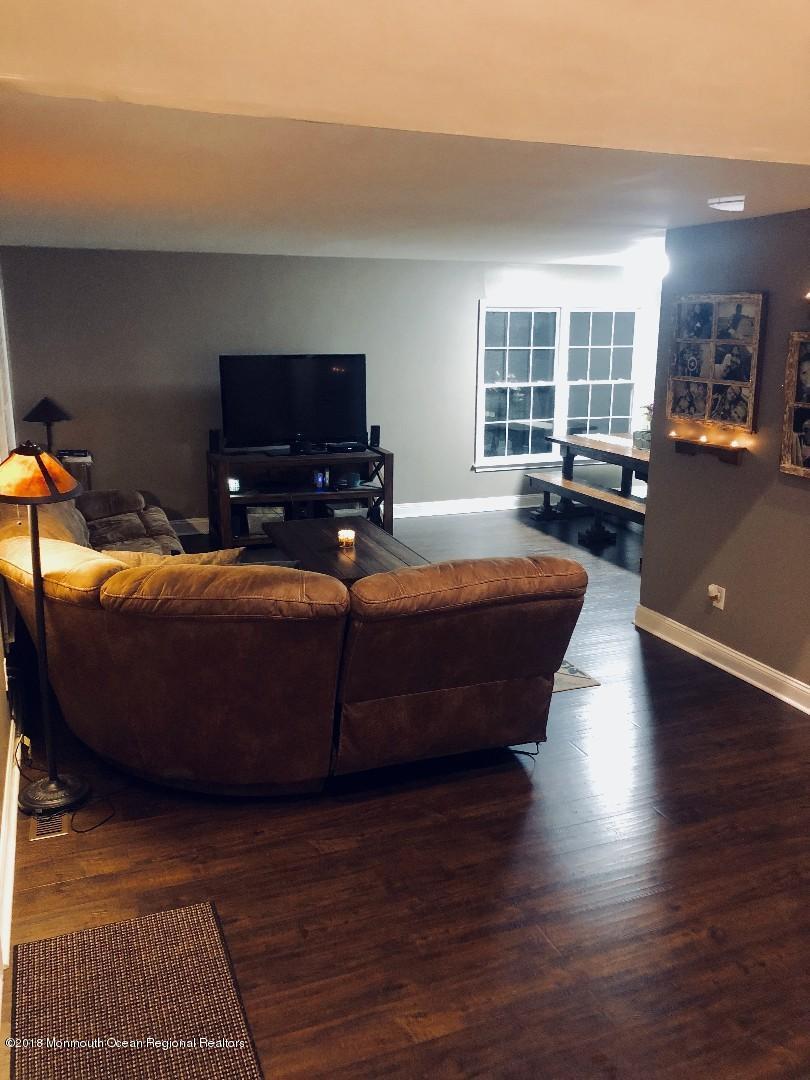 220 Schooner Road Manahawkin, NJ 08050 - Photo 22 of 25 a room with furniture and a window