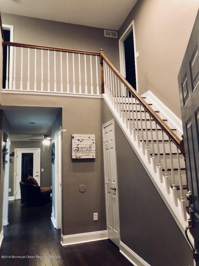 220 Schooner Road Manahawkin, NJ 08050 - Photo 24 of 25 a view of an entryway with a stairs