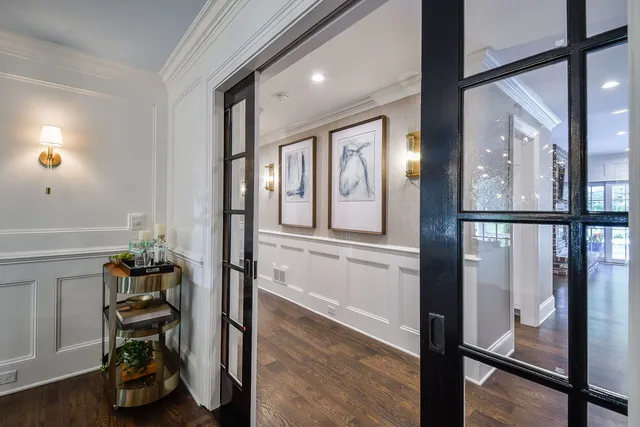 a large kitchen with lots of counter space a sink appliances and cabinets
