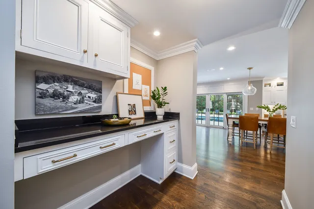 a kitchen with a stove and a refrigerator