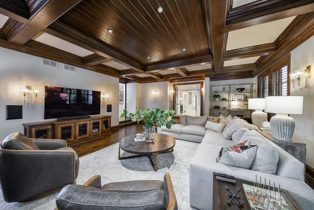a large bathroom with a large tub and sink
