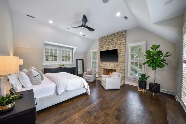a view of a kitchen with cabinets and wooden floor