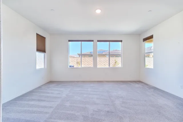 a bathroom with a sink a toilet and shower curtain