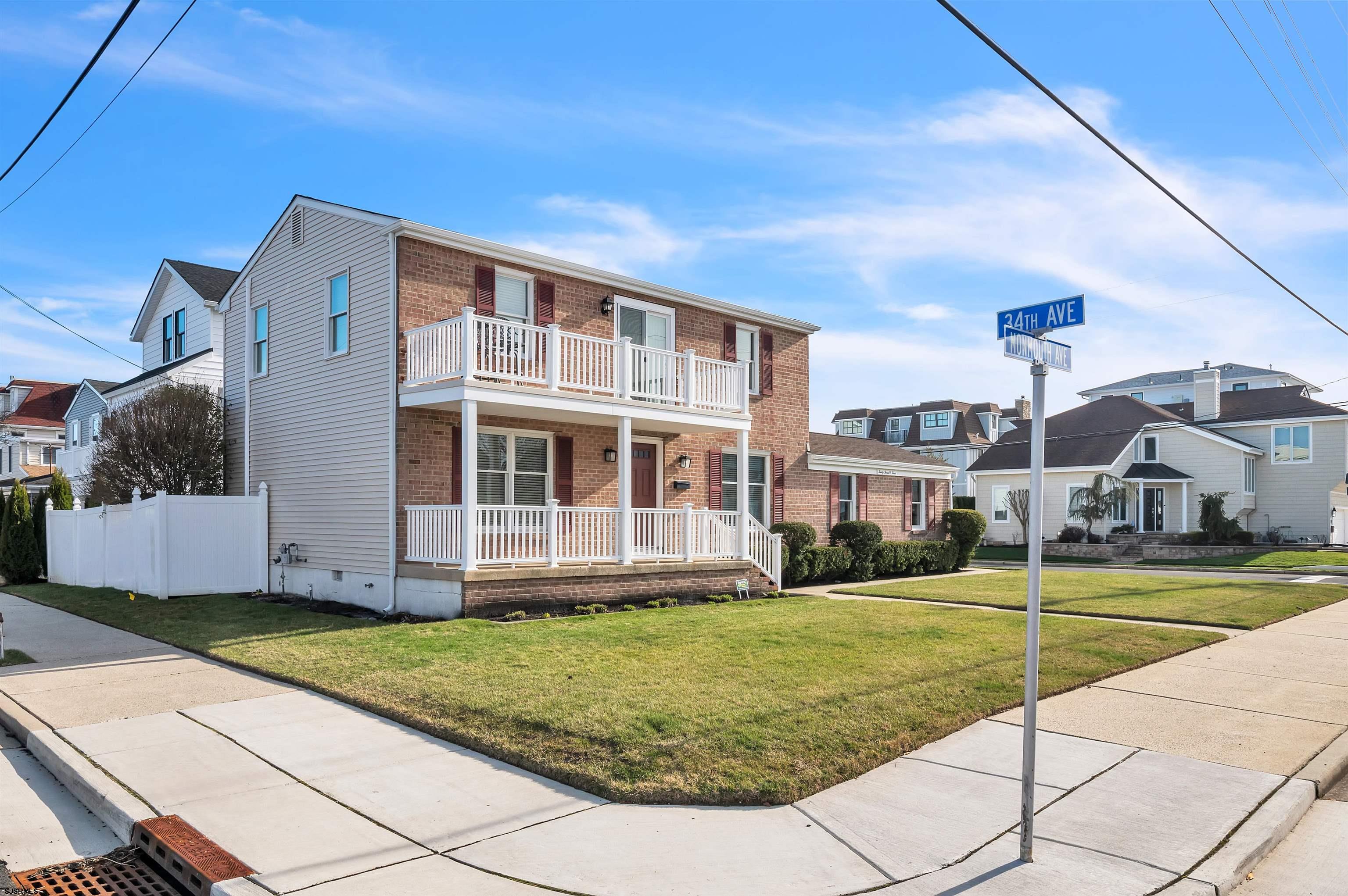 3304 Monmouth Avenue, Unit WINTER RENTAL Longport, NJ 08403 - Photo 2 of 29 a view of a house with a big yard