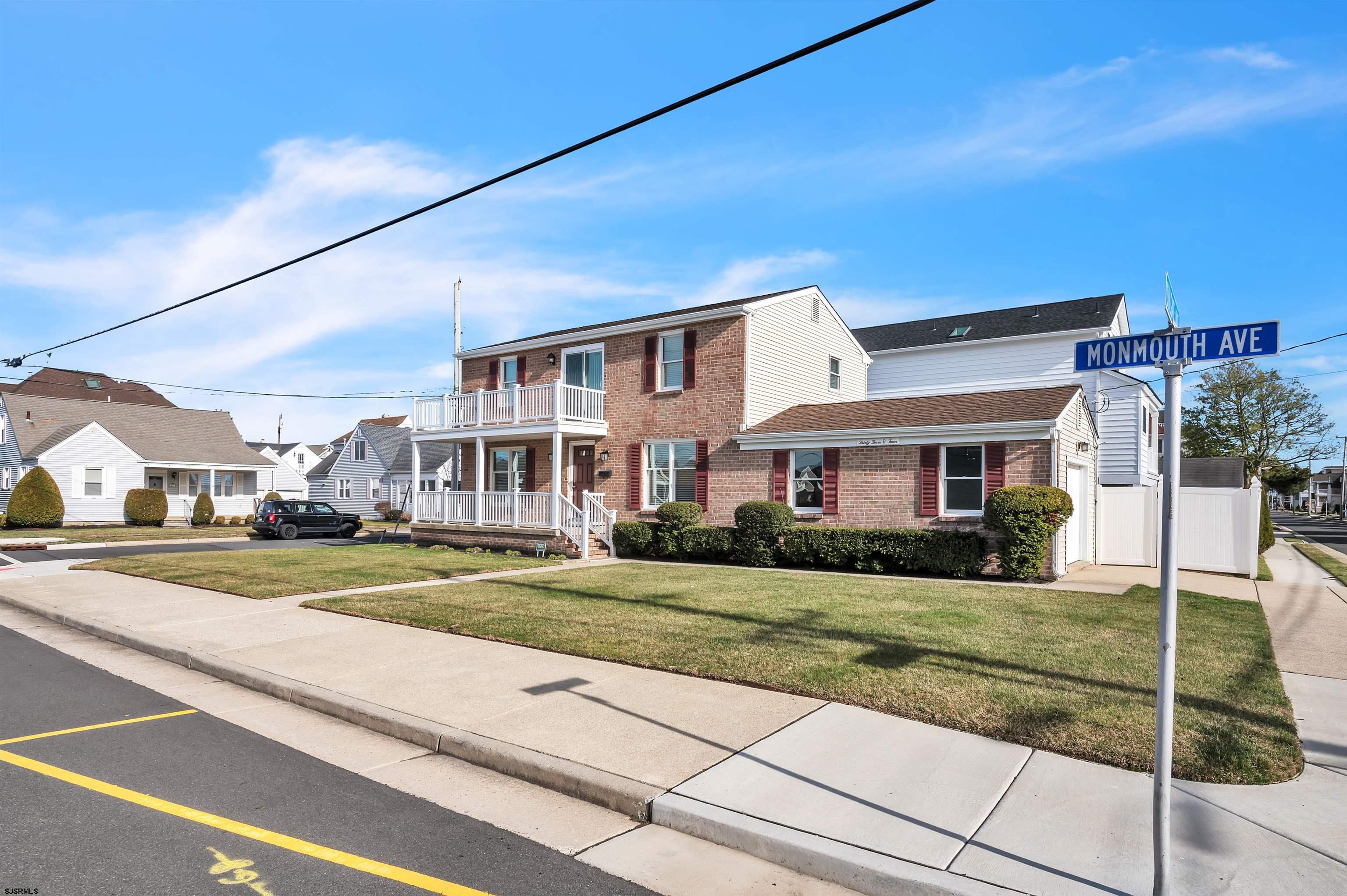 3304 Monmouth Avenue, Unit WINTER RENTAL Longport, NJ 08403 - Photo 29 of 29 a front view of a house with a yard