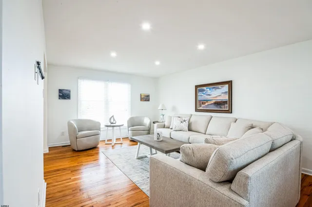 a living room with furniture and a couch
