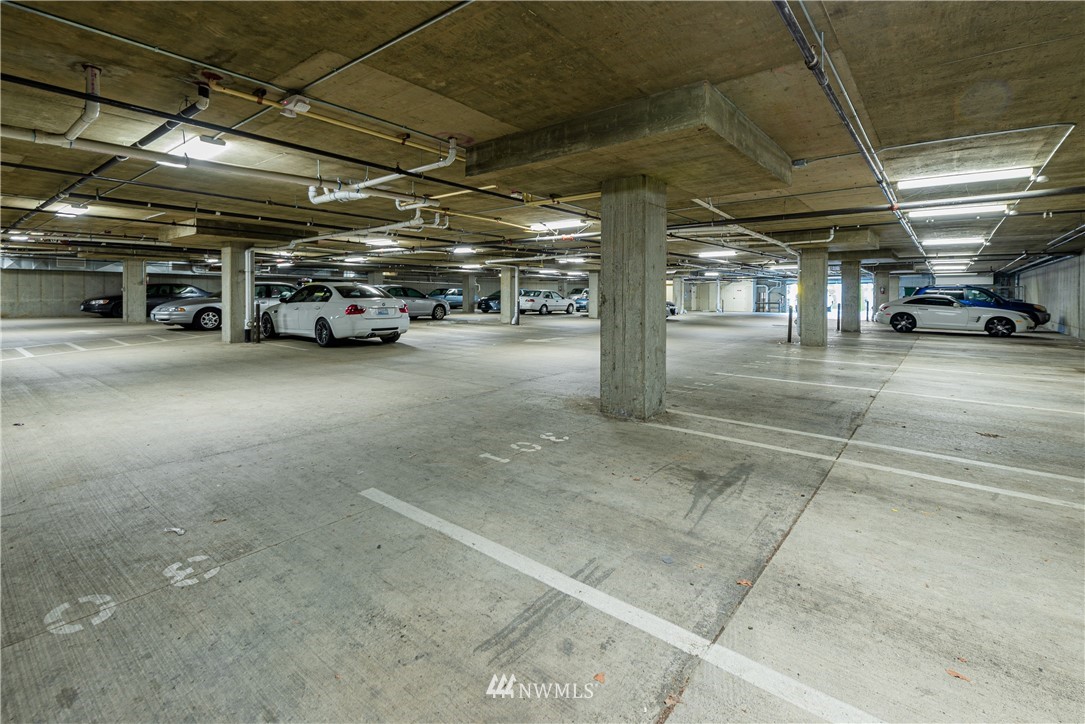 910 Gladstone Street, Unit 309 Bellingham, WA 98229 - Photo 20 of 25 a view of parking garage with cars