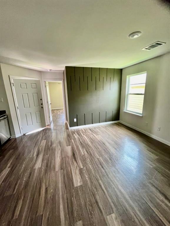 812 South 22nd Street Temple, TX 76501 - Photo 6 of 34 a view of a room with wooden floor and entryway