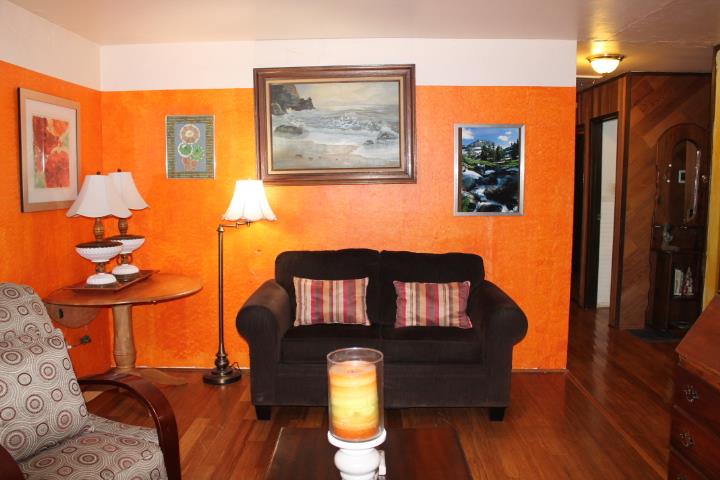 10433 Rockingham Drive Rancho Cordova, CA 95670 - Photo 16 of 34 a living room with furniture and wooden floor