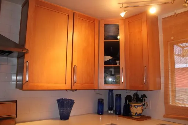 a close view of stove and microwave