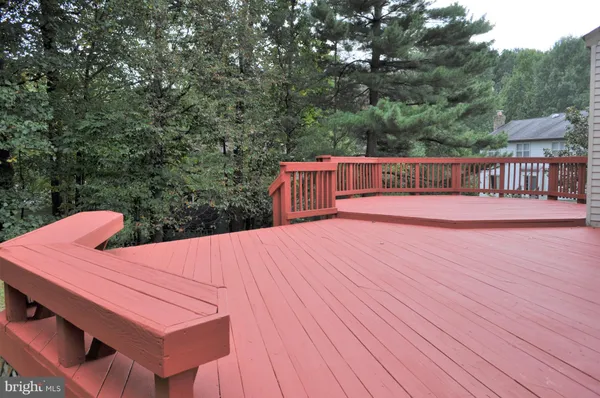 a view of a hallway with staircase
