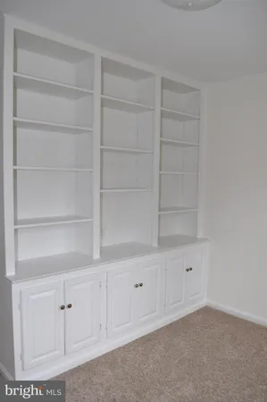 a bathroom with a tub and a shower