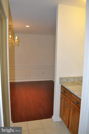 a bathroom with a sink a vanity and a mirror