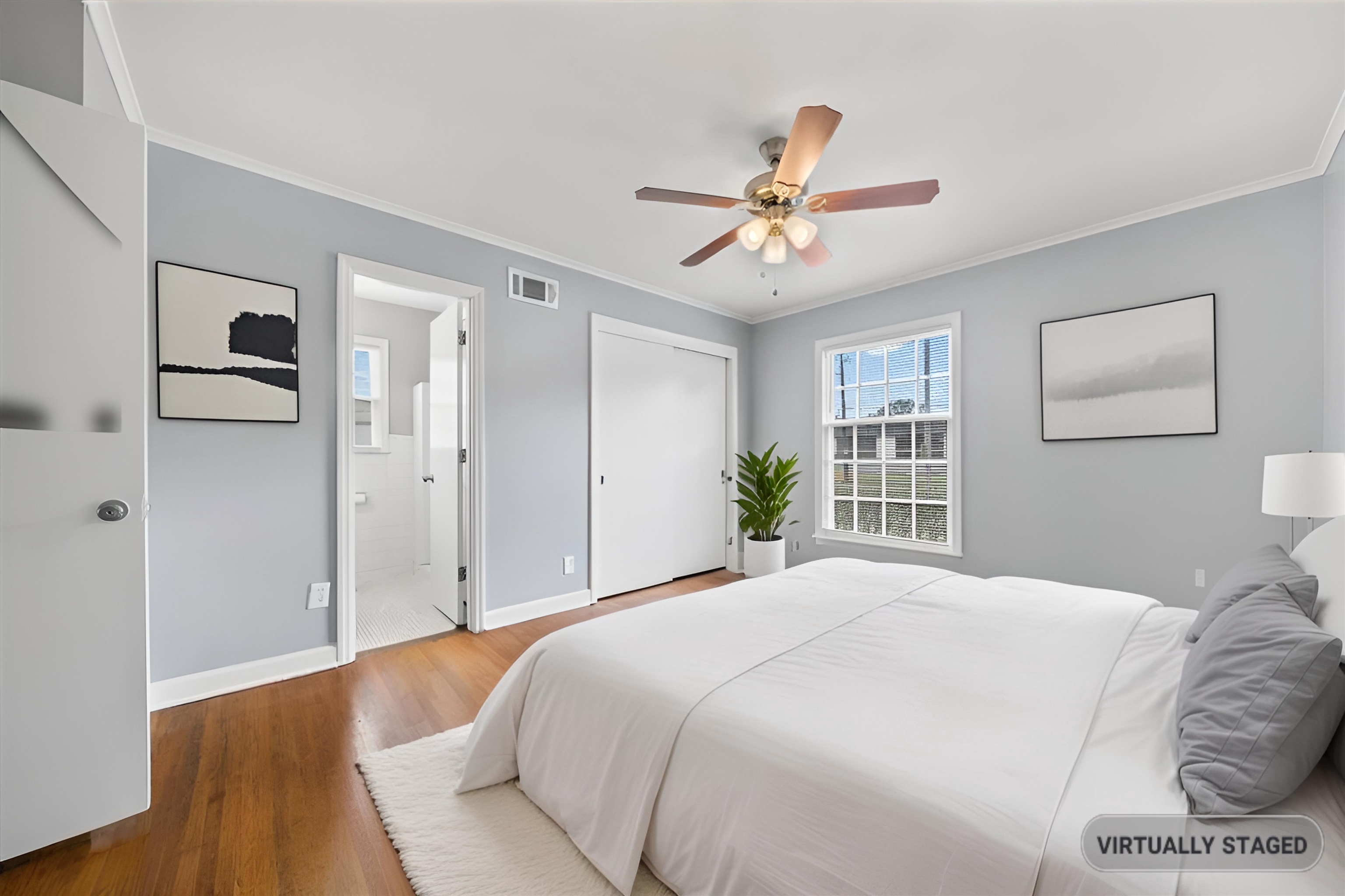 5343 Quince Road Memphis, TN 38119 - Photo 28 of 33 a spacious bedroom with a bed and a window