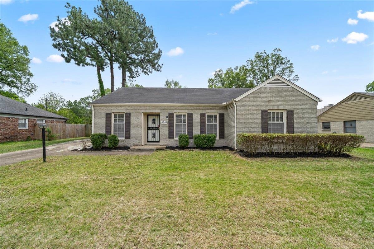 5343 Quince Road Memphis, TN 38119 - Photo 29 of 33 a front view of a house with a yard
