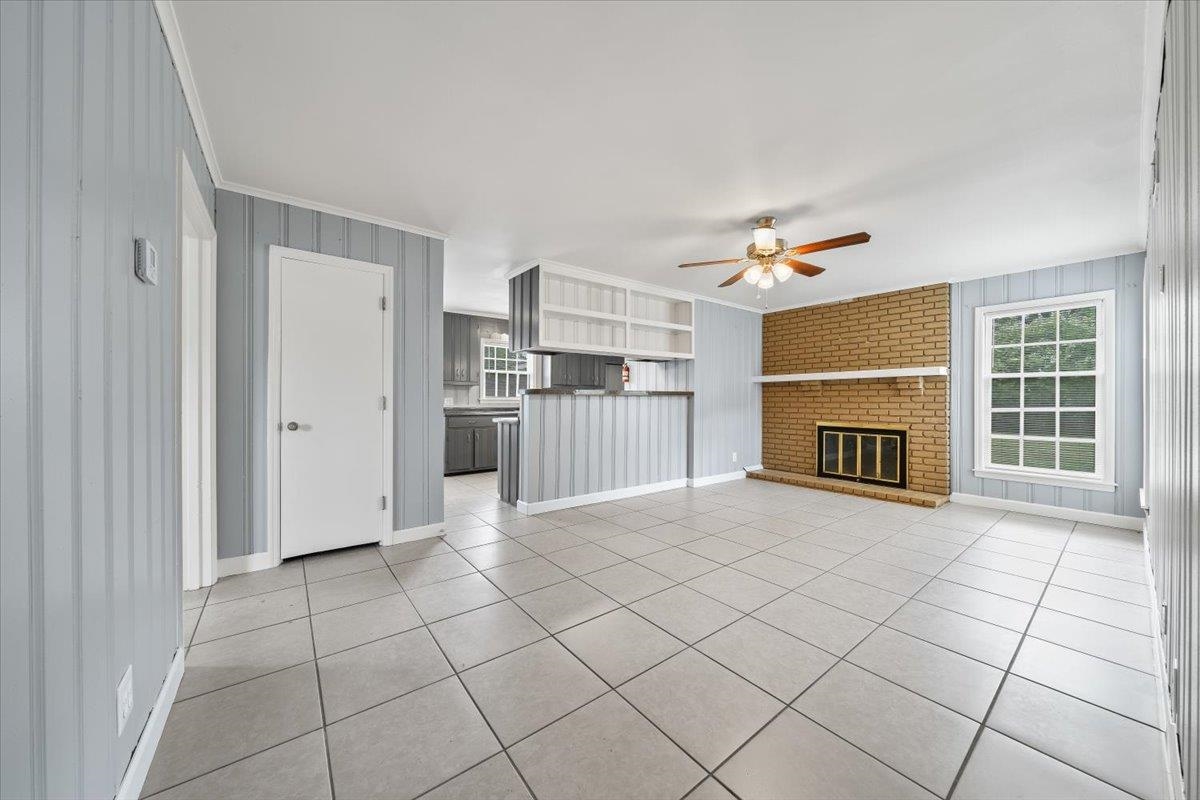 5343 Quince Road Memphis, TN 38119 - Photo 31 of 33 a view of a kitchen with furniture and a fireplace