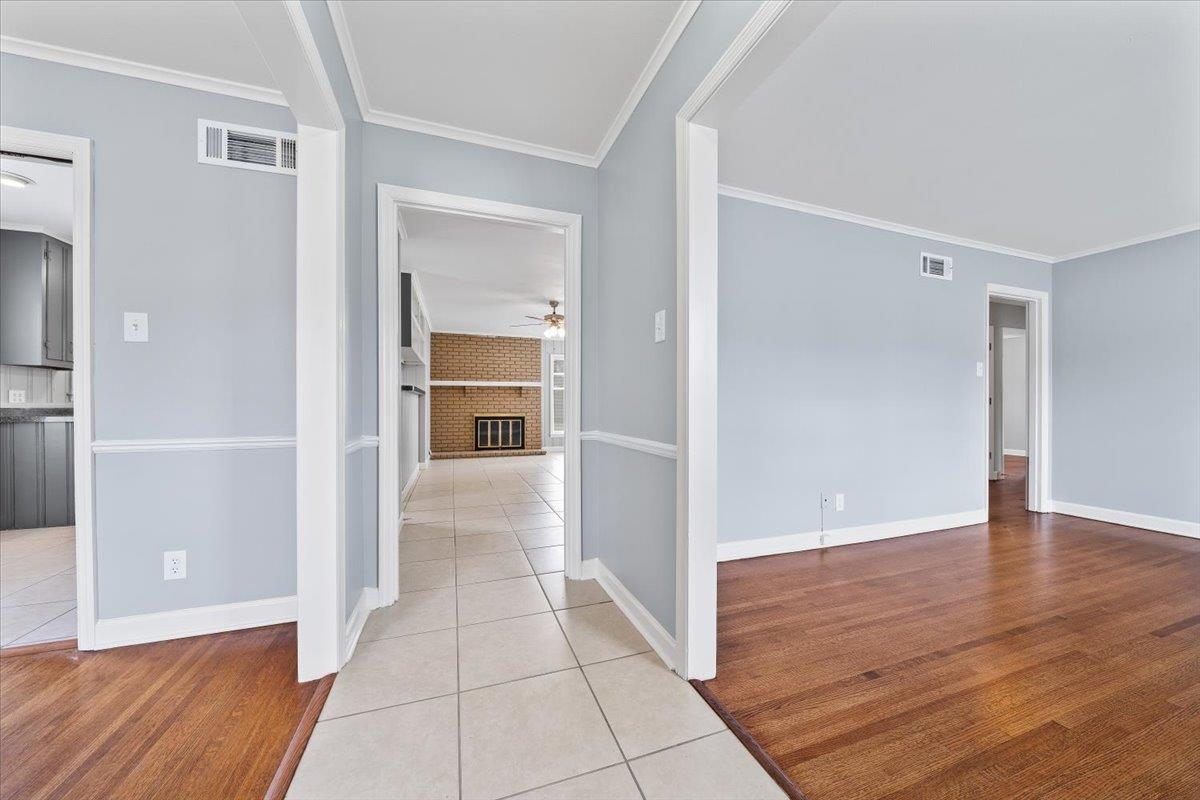 5343 Quince Road Memphis, TN 38119 - Photo 5 of 33 wooden floor with white walls