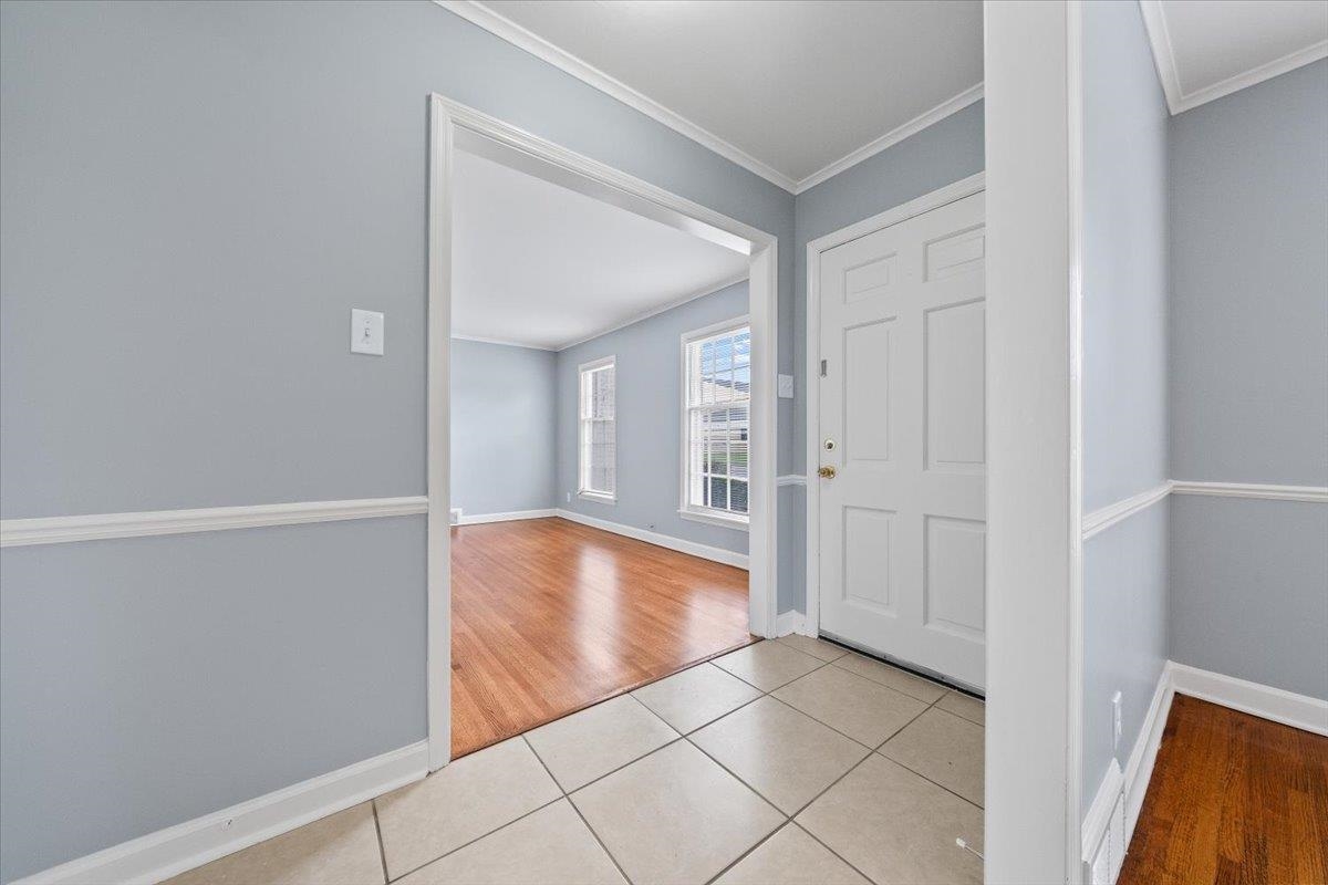 5343 Quince Road Memphis, TN 38119 - Photo 6 of 33 a view of livingroom with kitchen