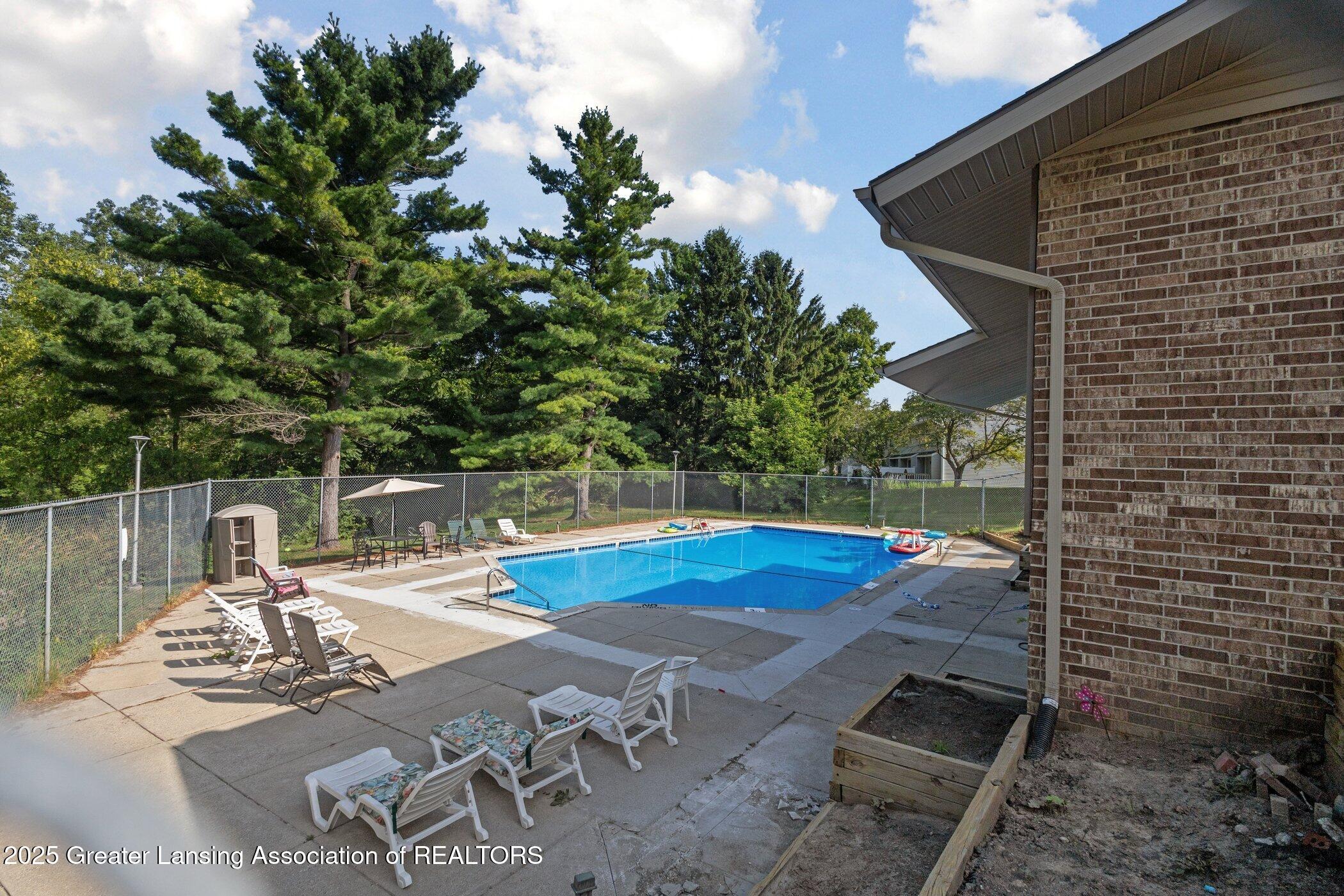 1725 Maple Ridge Road, Unit 60 Haslett, MI 48840 - Photo 15 of 16 pool