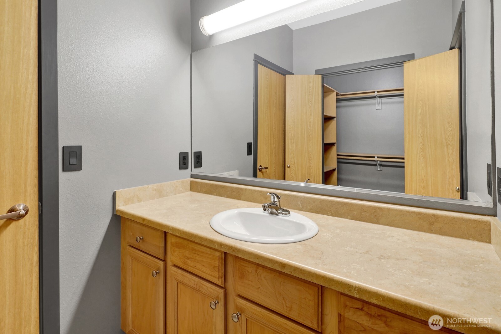 516 Darby Drive, Unit 104 Bellingham, WA 98226 - Photo 15 of 40 a bathroom with a sink and a mirror