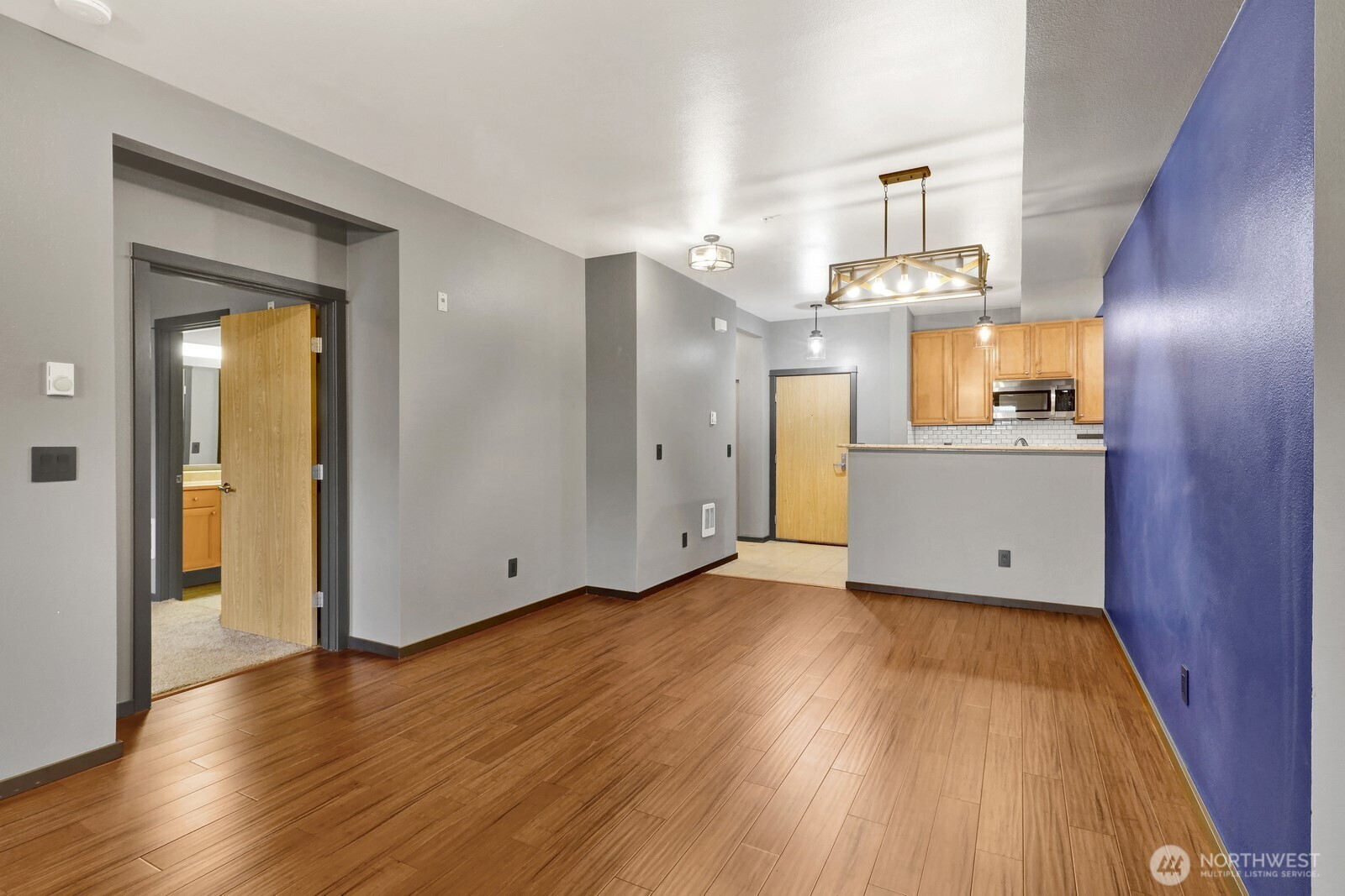 516 Darby Drive, Unit 104 Bellingham, WA 98226 - Photo 22 of 40 a view of a kitchen cabinets and wooden floor