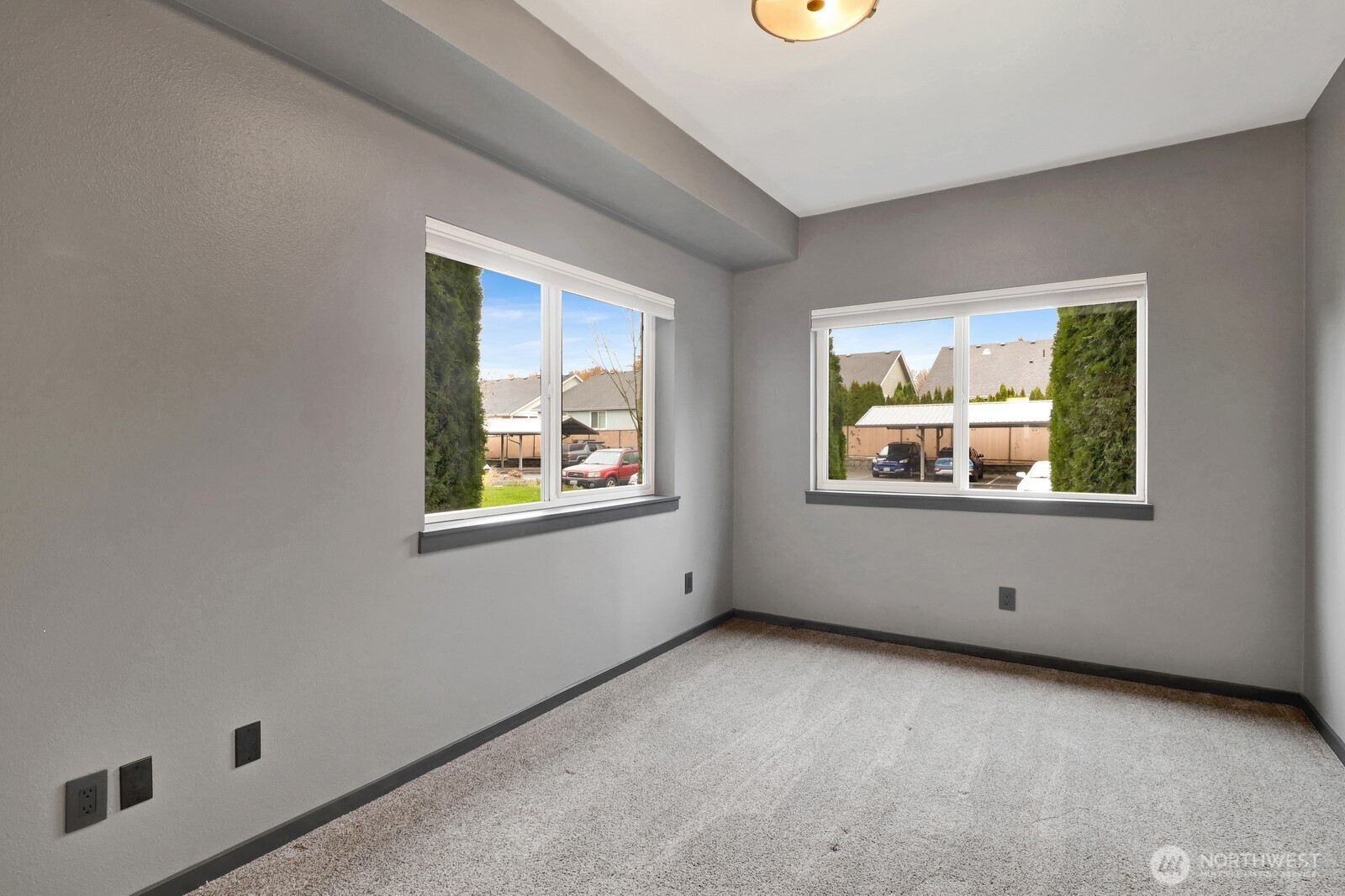 516 Darby Drive, Unit 104 Bellingham, WA 98226 - Photo 25 of 40 an empty room with windows