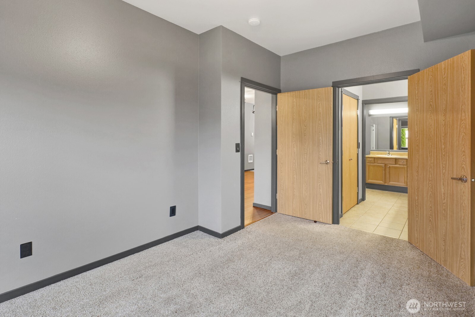 516 Darby Drive, Unit 104 Bellingham, WA 98226 - Photo 27 of 40 an empty room with closet and a bathroom