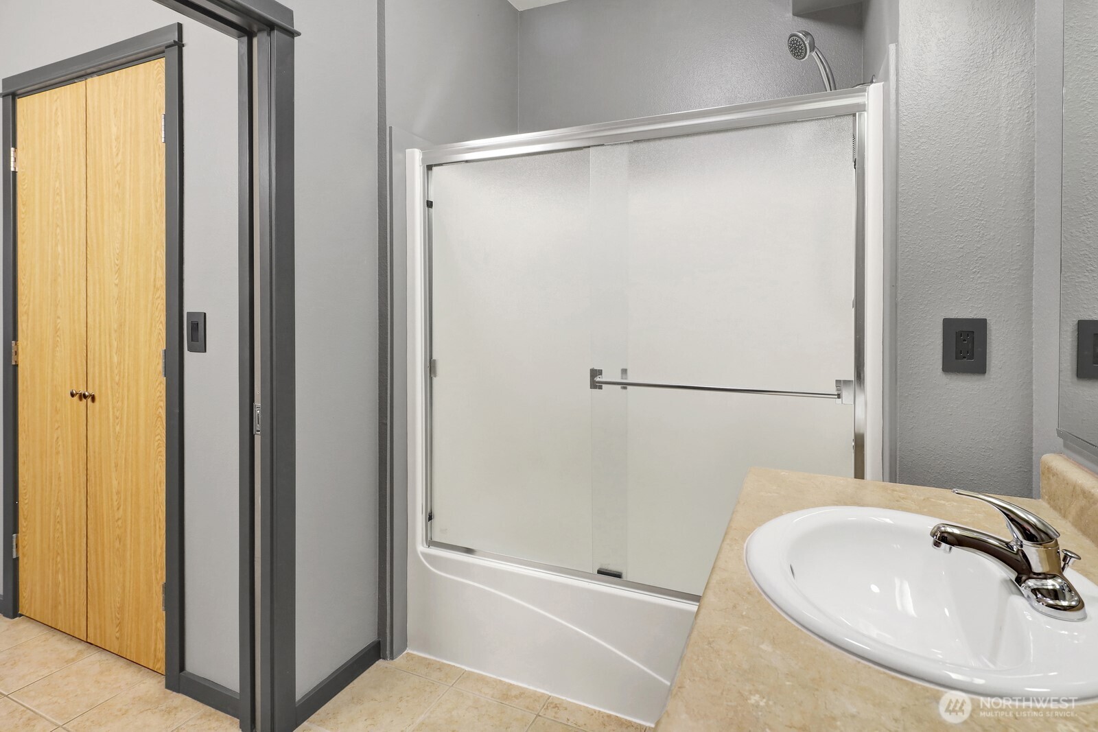 516 Darby Drive, Unit 104 Bellingham, WA 98226 - Photo 30 of 40 a bathroom with a sink and a mirror